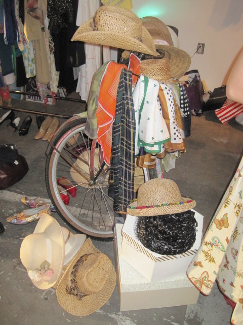 display of vintage hats on bike
