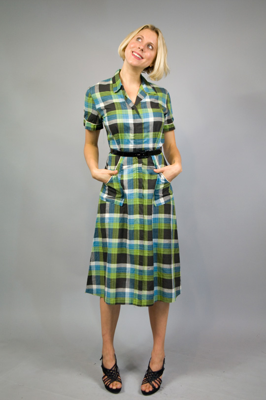 a 1940s country plaid dress with pockets