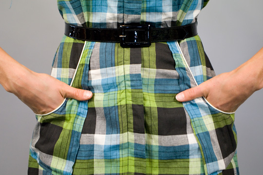 close up of the waist, belt and pockets of a 1940s country plaid dress